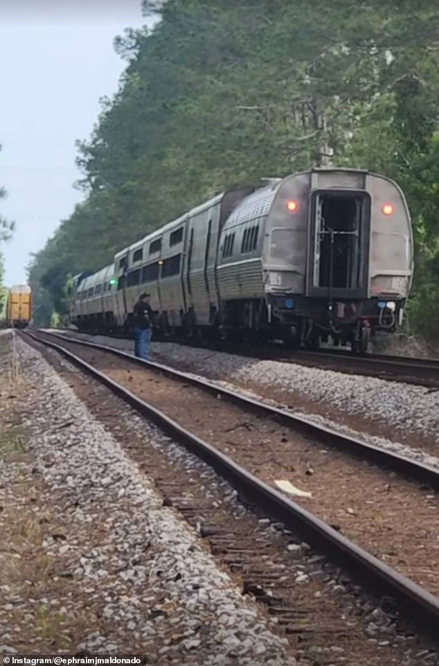 Amtrak passengers stranded for 24 hours after Florida brush fire blocks tracks.