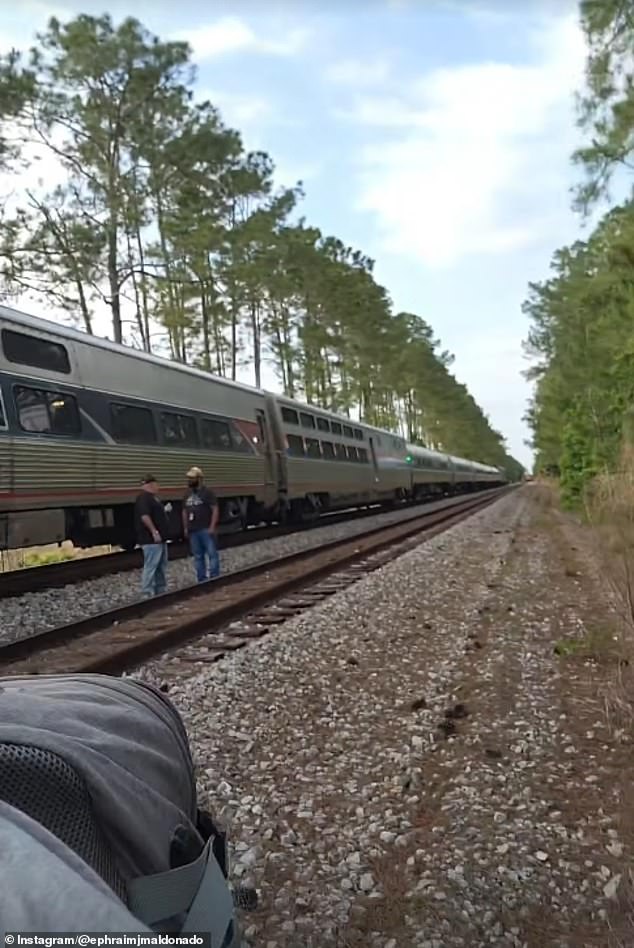 Amtrak passengers stranded for 24 hours after Florida brush fire blocks tracks.