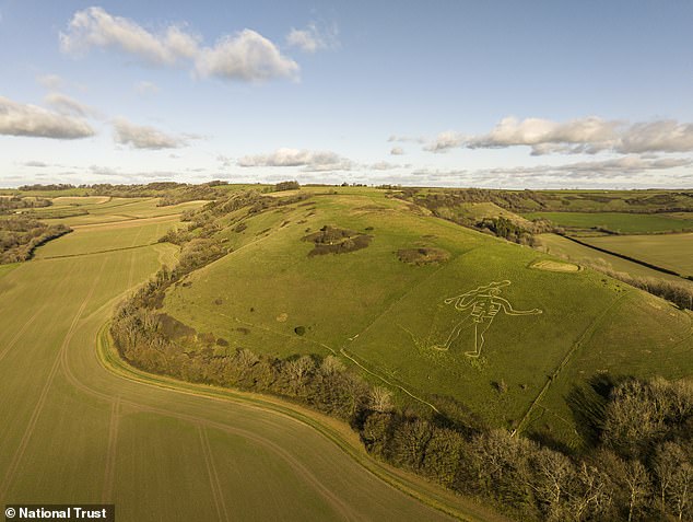 Experts restore Britain's iconic Cerne Abbas Giant with 17 tonnes of chalk.