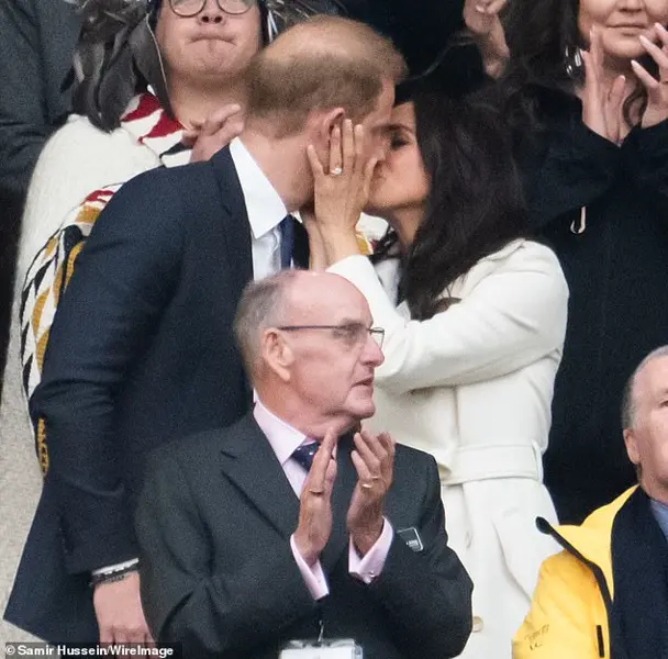 Harry and Meghan show public affection despite Trump's comments
