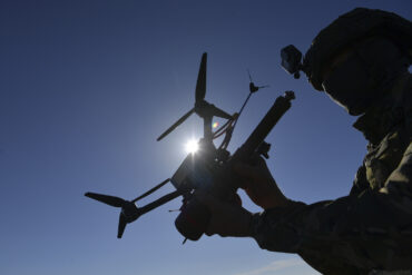 Russian Soldiers Use FPV Drone in Precision Strike on Ukrainian Base, Highlighting Modern Warfare Tactics