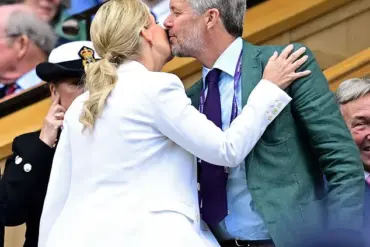 King Frederik of Denmark Exudes Enthusiasm at Wimbledon Day Eight, Vibrant Turquoise Blazer and Deep Violet Pants Match Tournament's Theme