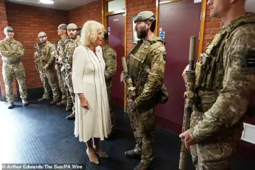 Queen Camilla Resumes Royal Duties in White Dress After Summer Break